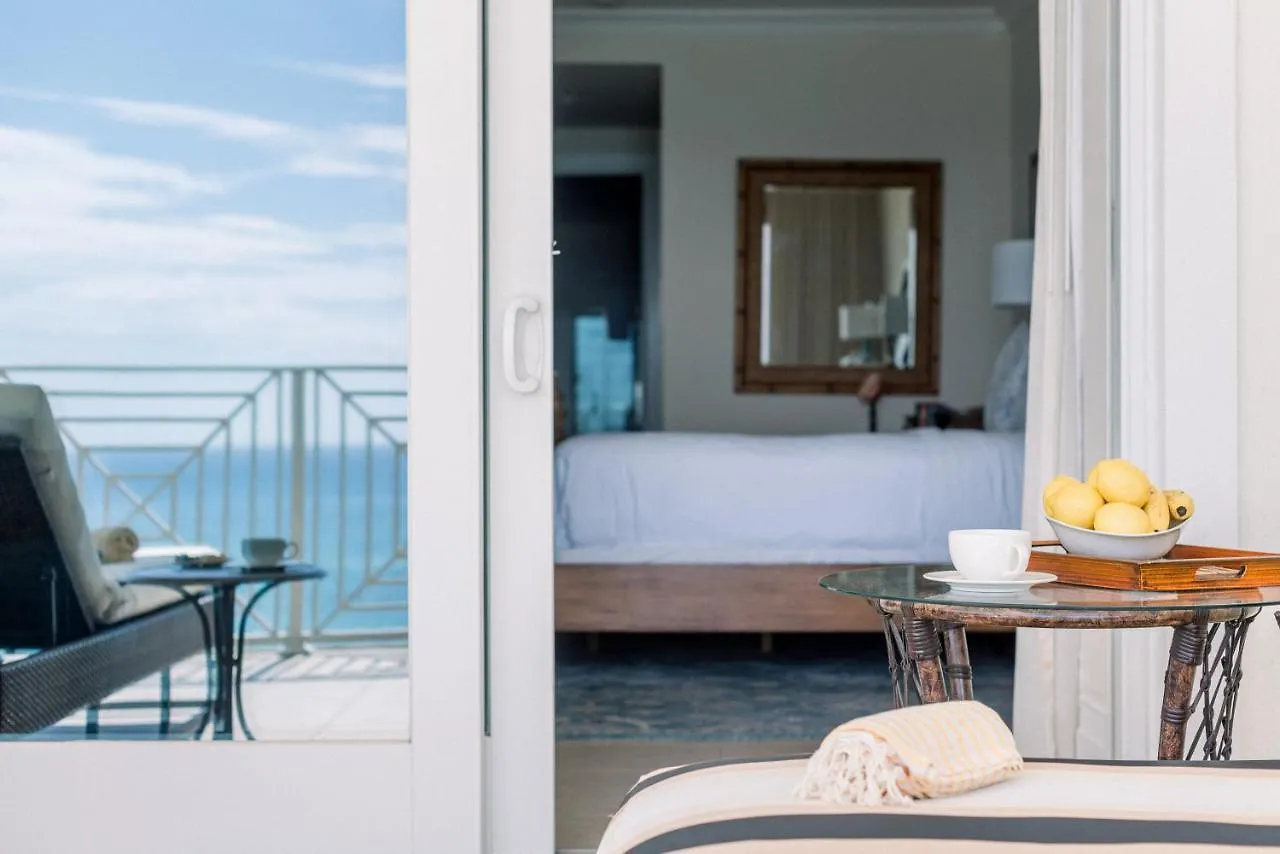 Отель Caribbean Club Boutique Hotel, Grand Cayman Seven Mile Beach